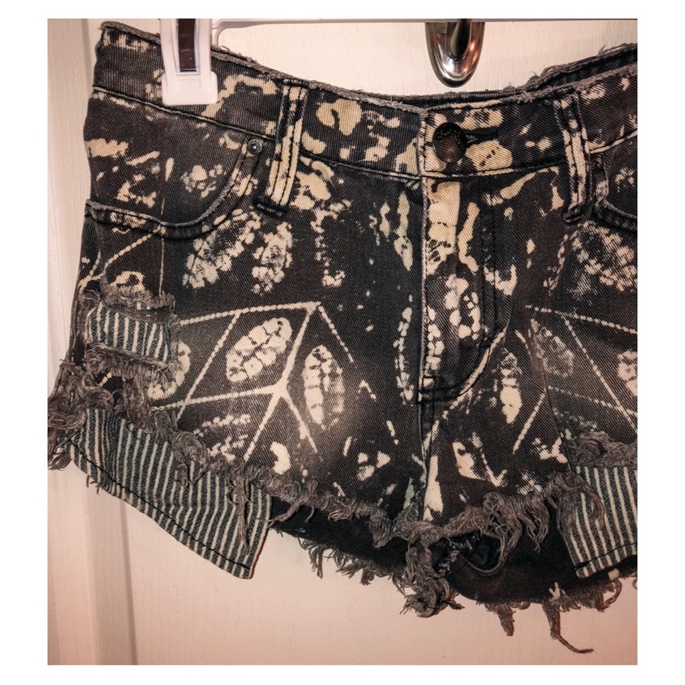 Free People Brown Acid Washed Jean Shorts.